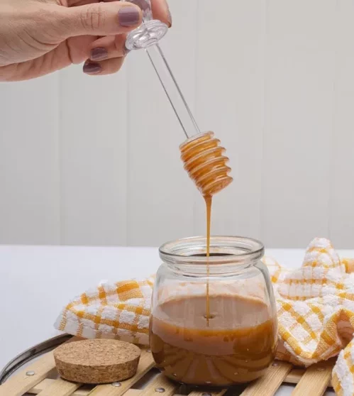 Organic acacia honey in a jar, 100% natural